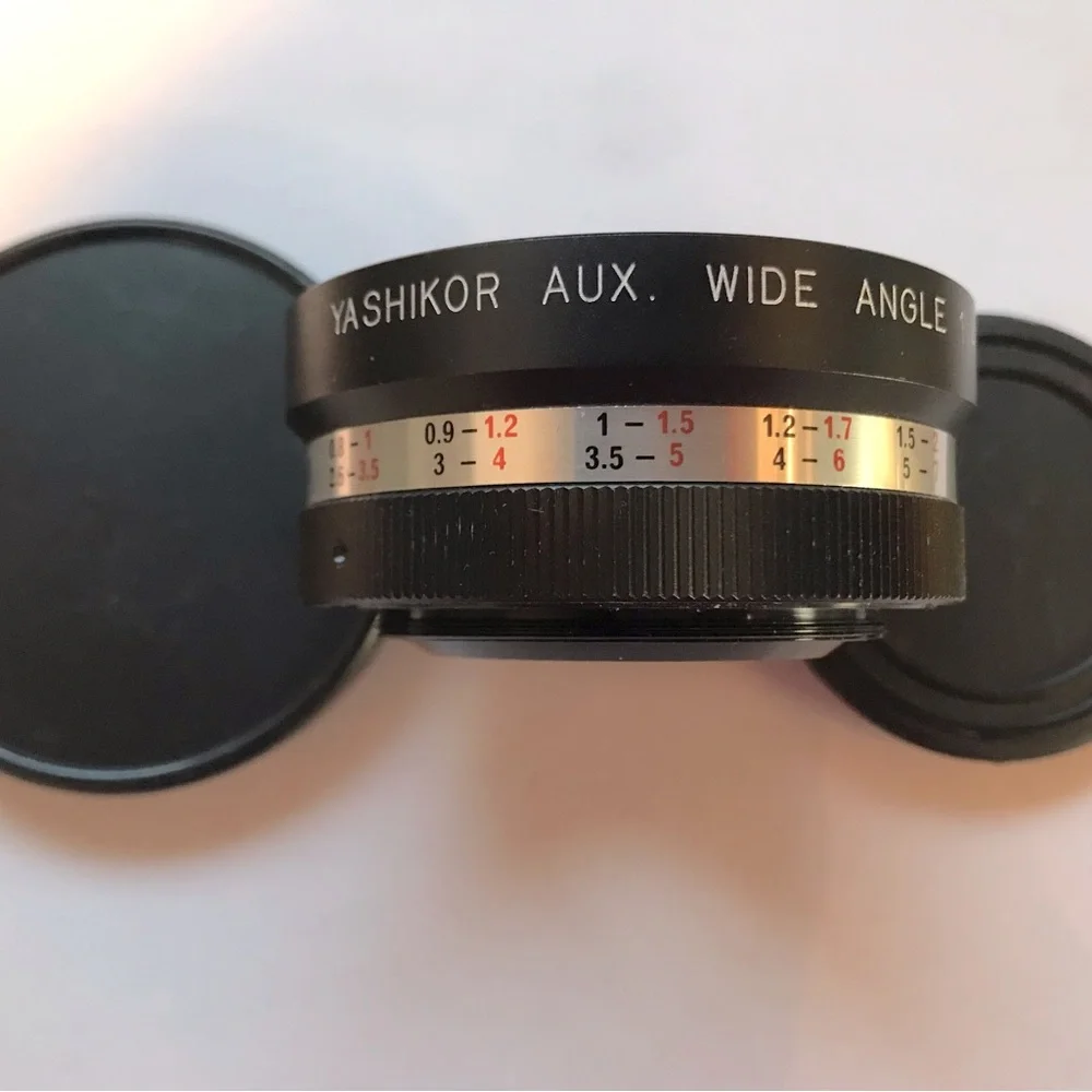 Yashikor aux wide angle and telephoto 1:4 lens